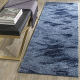 Modern Abstract Light Blue and Blue Area Rug