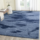 Modern Abstract Light Blue and Blue Area Rug