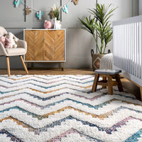 Geometric Rumi High-Low Chevron Tassel Area Rug